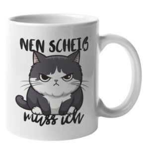 Weiße Tasse mit einer grimmig schauenden, schwarz-weißen Katze und dem handgeschriebenen Spruch „Nen Scheiß muss ich“ in Schwarz.
