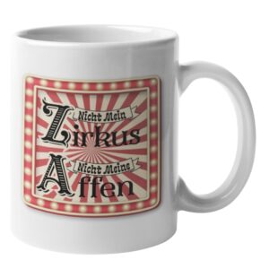 Weiße Kaffeetasse mit einem rot-weiß gestreiften Zirkus-Logo und dem Spruch „Nicht mein Zirkus, nicht meine Affen“ in nostalgischer Schrift.